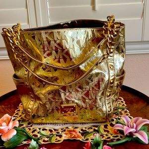 Just in time for summer beautiful gold Michael Kors tote